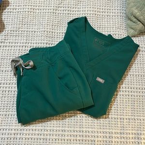 Dark Green Figs. XS jogger bottom, S tuck in top.